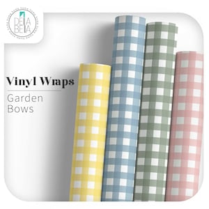 May include: Four rolls of vinyl wrap in yellow, blue, green, and pink, each with a white gingham pattern. The text "Vinyl Wraps" and "Garden Bows" are displayed on the left side of the image.