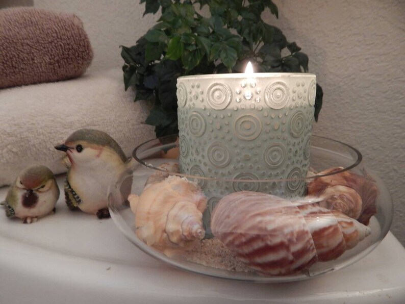 Candles by the ocean