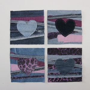 May include: Four square denim coasters with different heart designs. The hearts are made of denim, leopard print fabric, and pink fabric. The coasters are layered with strips of denim and other fabrics.