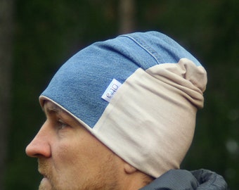 May include: A blue and beige beanie with a white label that says "R40".