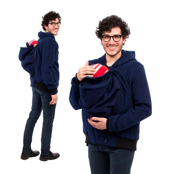 man with baby carrier