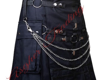 Könnte beinhalten: Schwarzer Kilt mit silberner Kette und Metallbeschlägen. Er hat Taschen, verstellbare Riemen und Metallringe. Der Kilt hat ein plissiertes Design und ist aus strapazierfähigem Stoff gefertigt. Der Kilt hat den Text "Asgher Trading" in Rot.
