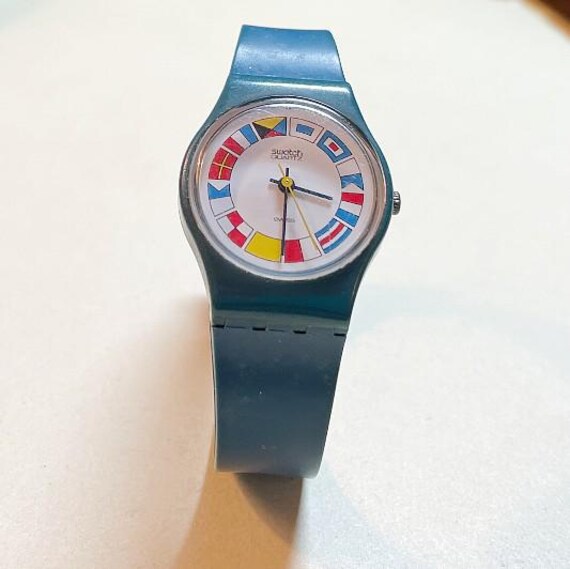 Vintage Swatch Watch 12 Flags LS101, Blue Plastic Case and Vintage Swatch Watch 12 Flags LS101, Blue Plastic Case and
