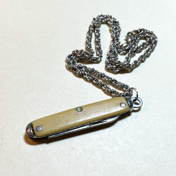 Handmade shabby little vintage knife necklace, knife pendant, 18 inch chain, silvertone metal, white plastic, HIT USA knife, K121