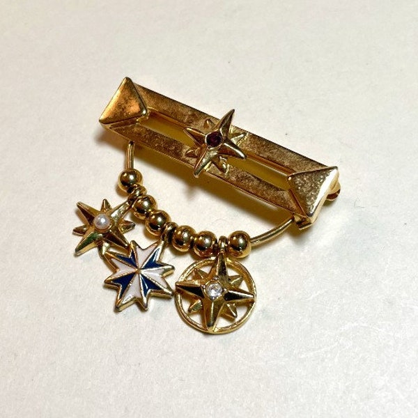 Vintage Avon Presidents Club brooch, goldtone metal bar pin with three star charms, enamel, rhinestones, faux pearl, Avon brooch, 1980s P441