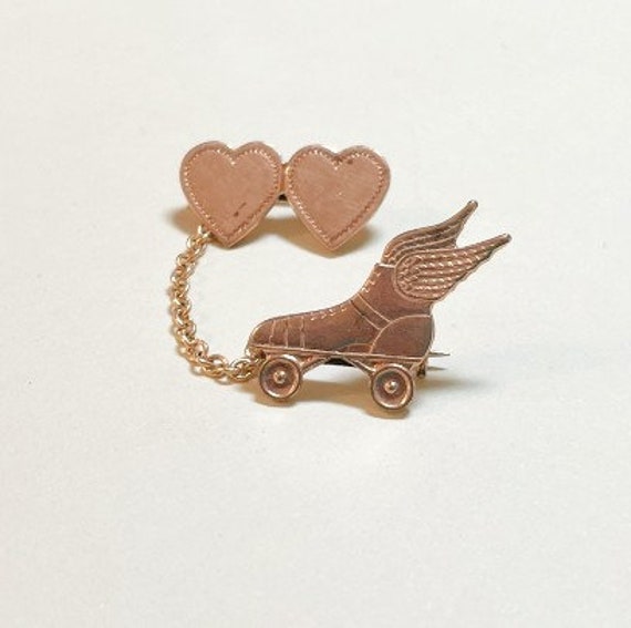 Vintage skating sweethearts pin with winged rolle… - image 1