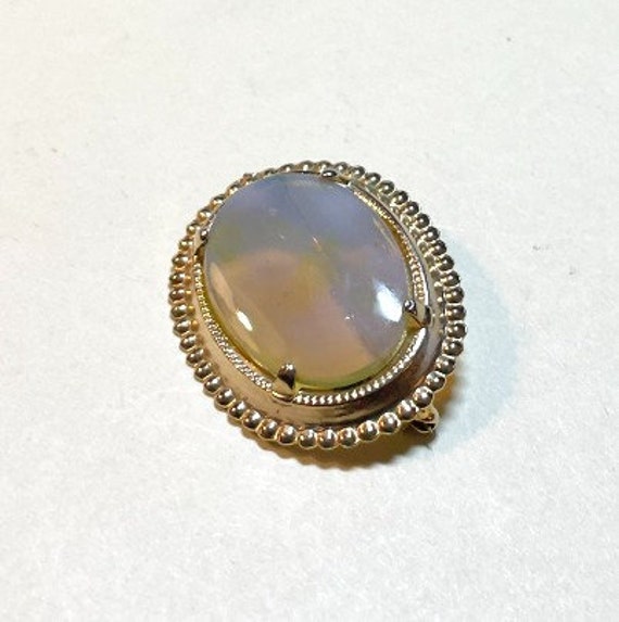 Vintage opalescent stone brooch, goldtone metal, … - image 1