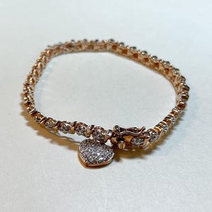 Vintage Ross Simons tennis bracelet with heart charm, fits 7 inches, 925 vermeil, clear stones, S style bracelet, gold plated  BD8178