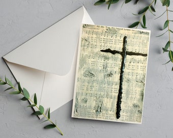 May include: A black cross painted on a vintage sheet music background. The cross is thick and textured, with a rough, brushstroke effect. The sheet music is faded and worn, with visible lines and notes.