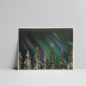 May include: A painting of a snowy forest with a vibrant green and purple aurora borealis in the night sky.