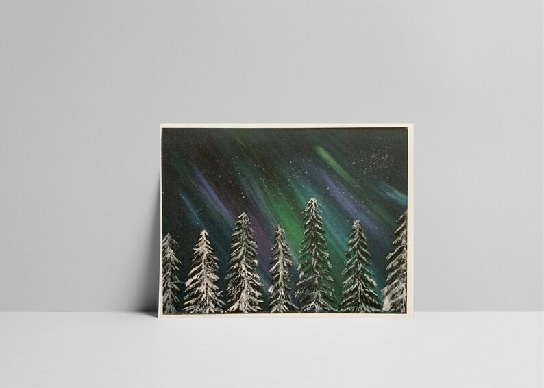 May include: A painting of a snowy forest with a vibrant green and purple aurora borealis in the night sky.