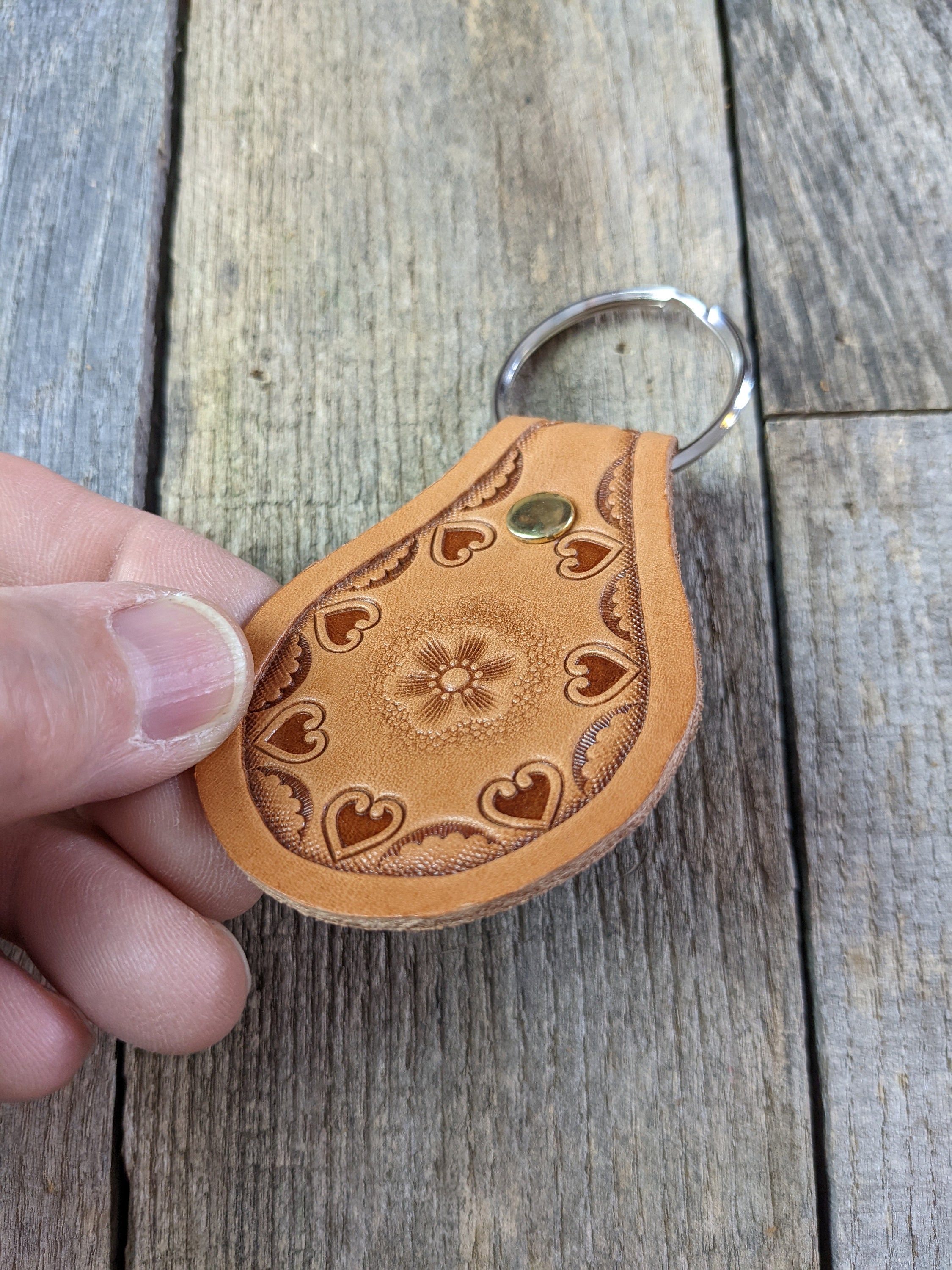 Stamped Leather Keychain with Flower Center and Heart Border Design