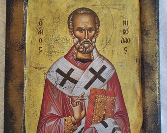 Saint Nikolas. Orthodox greek handmade religious icon based on byzantine mount Athos style. (Αγιος Νικόλαος)