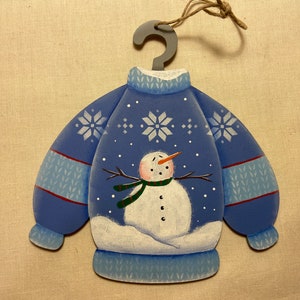 Blaue nicht so hässliche Weihnachtsstrickjacken-Verzierung