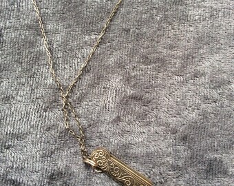 collar colgante peine de plata