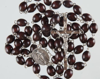 Hand Made Brown Wood Rosary Beads. Miraculous Medal Centre Piece. Strong Metal Wire Links.