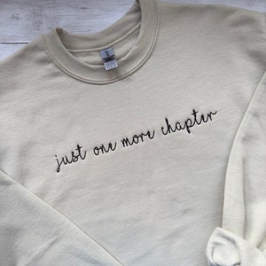 Just One More Chapter Embroidered Crewneck Sweatshirt