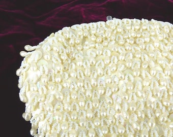 Winter white seed bead, sequin and pearl beaded Holiday Party or bridal purse. Silver kiss lock closure and wrist chain. Gift packaged.