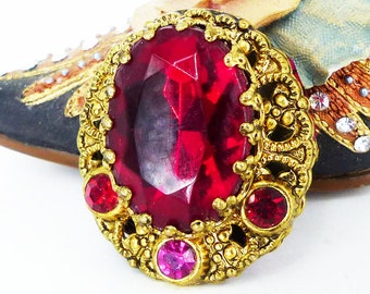 Magnetic brooch Mag TAK™ Vintage ruby red and pink rhinestones & antique gold filigree. Brooch, or scarf pin. Silk covered back button.