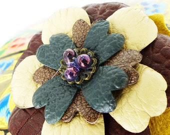 Magnetic textured leather flower lapel pin or brooch. Forest green, cream & burgundy with glass bead center. Silk covered back button