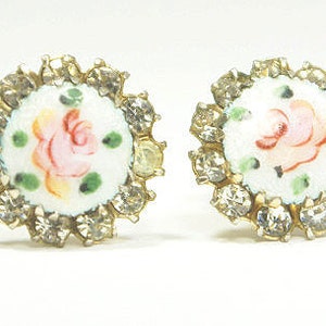 Sweet little antique Coro Enameled Rose Earrings. Hand-painted on a guilloché pattern with pink roses and green leaves & clear rhinestones.