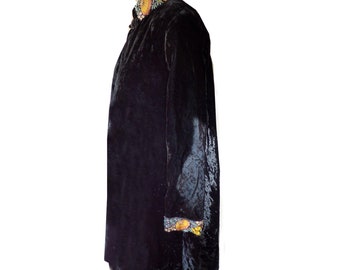 Nehru collar mid calf swing coat black velvet fully lined with hand embellished embroidered trim on cuffs and collar. Size L one of a kind