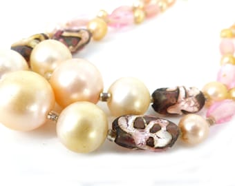 Elegant double strand choker necklace with gold crackle glass beads with cream faux pearls details and dangle chain pearl hook closure