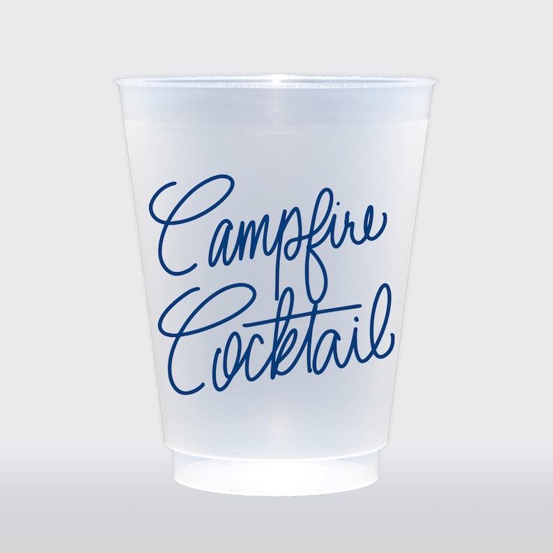 May include: A clear plastic cup with the text "Campfire Cocktail" written in blue cursive.