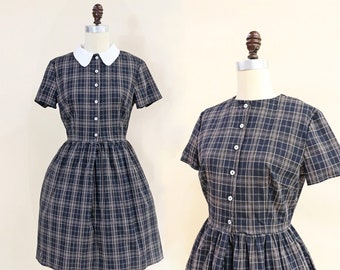 ACADEMY | little black dress with collar and pockets. black dress with white collar. 1950s retro vintage style black plaid dress.