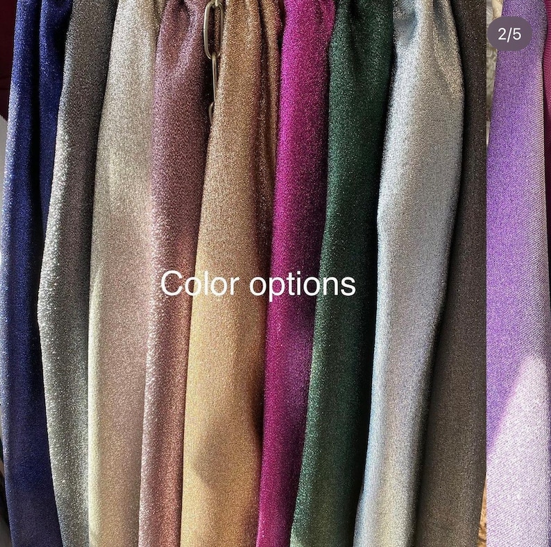 May include: A selection of fabric swatches in various colors, including navy blue, silver, rose gold, gold, purple, green, light blue, gray, and lavender. The swatches are arranged vertically and labeled "Color options".