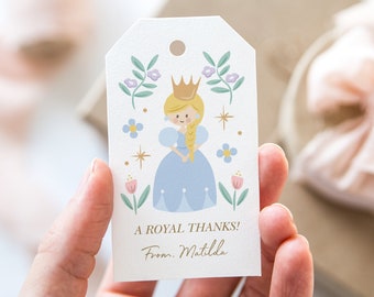 May include: A white gift tag with a cartoon princess wearing a blue dress and a gold crown. The tag has a floral design and the text "A Royal Thanks! From Matilda".