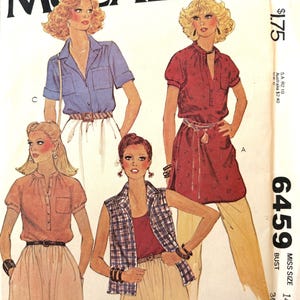 May include: Vintage McCall's sewing pattern featuring four women's fashion designs. The designs include a blue shirt, a red tunic, a peach-colored blouse, and a plaid vest. The pattern number is 6459, and the bust size is 36 inches.