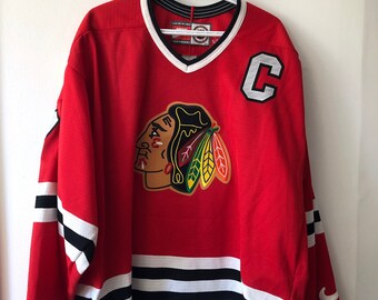 Vintage CCM Chicago Blackhawks hockey jersey in red. - Depop