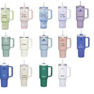 May include: A set of 18 stainless steel travel mugs with various tie-dye patterns and colors. The mugs have a handle and a straw. The colors include green, blue, pink, purple, white, and cream.