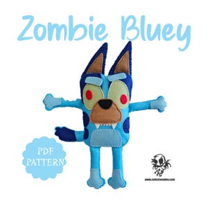 May include: A handmade felt plush toy of a zombie dog, in shades of blue, brown, and tan. The toy has red eyes, sharp teeth, and the text "Zombie Bluey" above it. A light blue cloud shape with "PDF PATTERN" is below the toy.