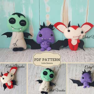 Puede incluir: Patrón PDF para cinco juguetes de monstruos de fieltro. Los monstruos son un monstruo morado con colmillos, un monstruo verde con colmillos, un monstruo rojo con colmillos, un monstruo verde con colmillos y un monstruo blanco con colmillos. El patrón se titula "Little Demons" y es de "Cutest Voodoo".