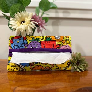 Sun visor tissue pouch