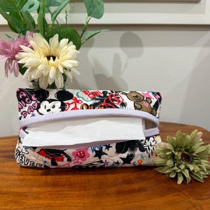 Sun visor tissue pouch