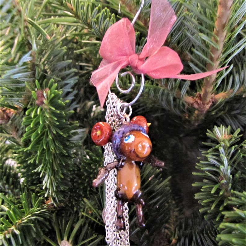 Fun Acorn Girl With Two Bobbles On Her Hat Necklace Is Created With Real Acorns And Twigs For Unique Gift Giving Only At JonnyBsArt