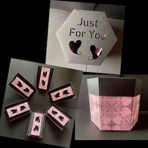 May include: A selection of handmade gift boxes and cards. The main box is hexagonal with the text "Just For You" and heart cutouts. Smaller cards feature heart designs. The boxes and cards are black and pink.