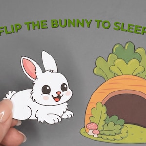 Könnte beinhalten: Illustration eines weißen Kaninchens mit rosa Innenohren und einem lächelnden Gesicht, neben einem Cartoon-Karottenhaus mit grünen Blättern und Pilzen. Der Text "FLIP THE BUNNY TO SLEEP" steht über dem Kaninchen.