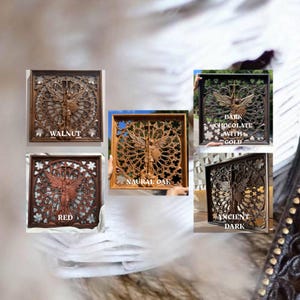 May include: Five square wooden wall art panels featuring a central carved angel figure with wings spread, surrounded by intricate gothic-style lattice patterns. The panels are shown in five distinct finishes labeled Walnut, Red, Natural Oak, Dark Chocolate with Gold, and Ancient Dark.