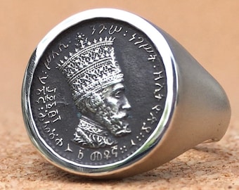 Emperor Selassie I signet ring. Textured band and blackened silver coin first issued in 1931 for the newly crowned Negus. Rasta history ring