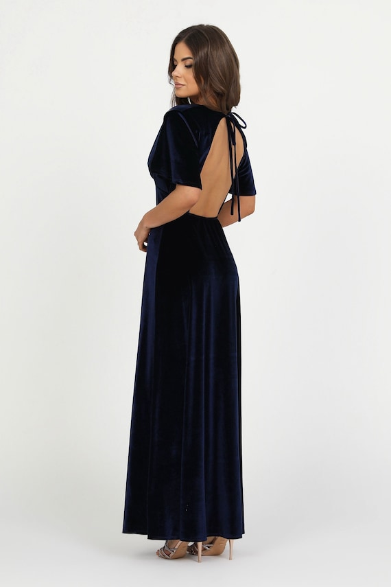 a backless dress and some Zelda Side Slit Velvet Sequin Gown