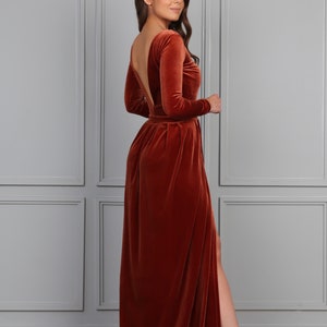 rust velvet maxi dress with slit, long sleeve velvet evening gown, fall wedding guest velvet dress, elegant autumn formal dress, rust color velvet gown, winter evening velvet dress, classic velvet maxi dress women, formal holiday velvet gown, modest long sleeve evening dress, luxury velvet dress fall