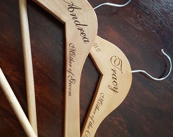 laser engraved bridal wooden coathangers with engraving on the arms