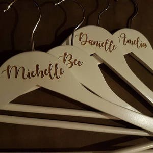 white laser engraved bridal wooden coathangers image 2