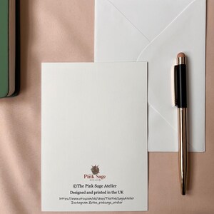 the back of the postcard showingThe Pink Sage Atelier logo and contact details