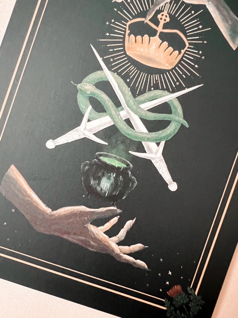 detail of the daggers, snake,couldron and hand