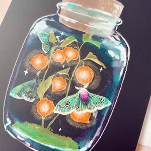 detail of the moths and lanterns
